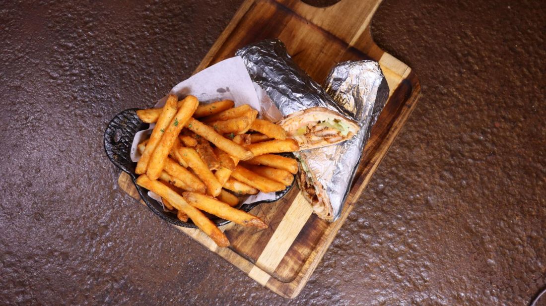 Wrap served with seasoned fries