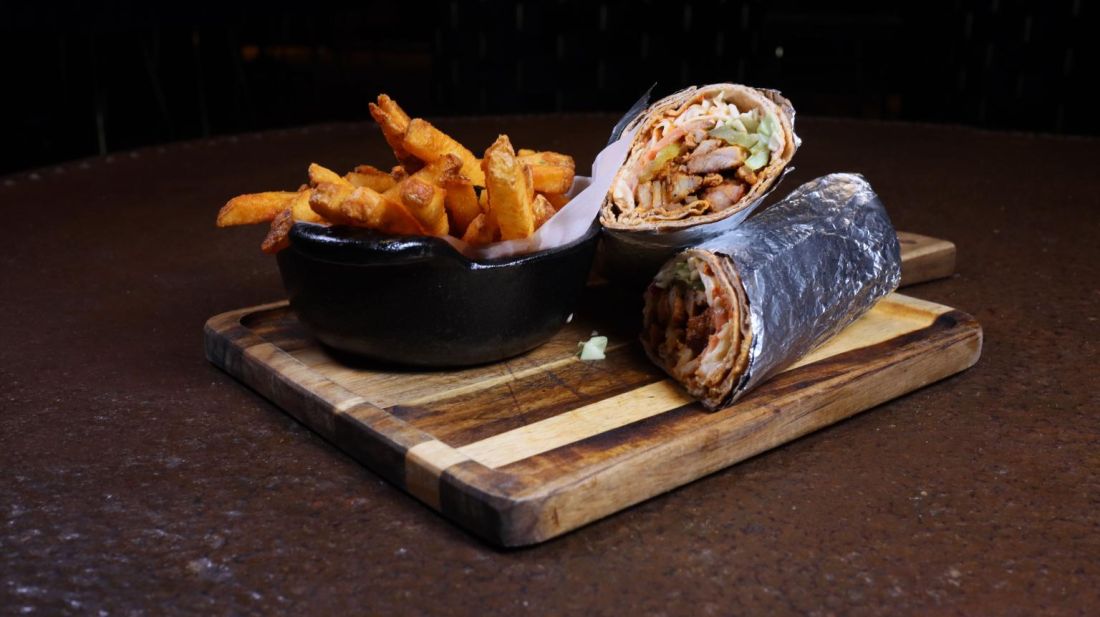 Wrap served with seasoned fries